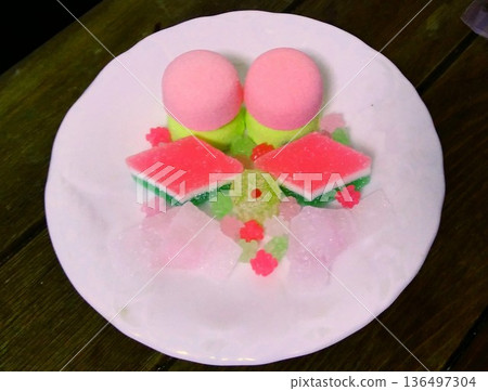 Hina sweets on a white plate Hina sweets on a white plate 136497304