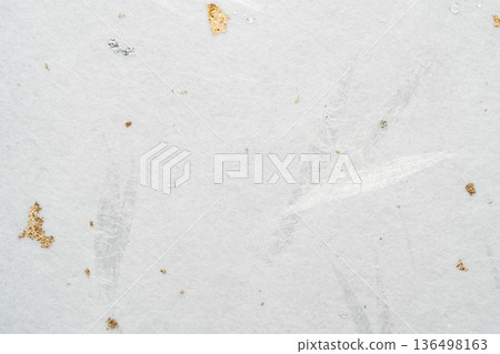 Stock photo of gold and silver foil shining on white Japanese paper Stock photo of gold and silver foil shining on white Japanese paper 136498163