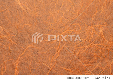 Orange washi paper with a fibrous pattern 136498164