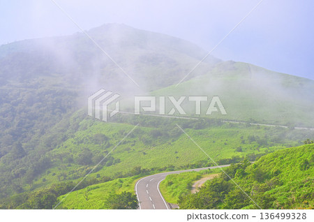Izu Peninsula, Izuyama Ridge Trail in Summer, Mt. Daruma as the fog clears from Mt. Kodaruma Izu Peninsula, Izuyama Ridge Trail in Summer, Mt. Daruma as the fog clears from Mt. Kodaruma 136499328