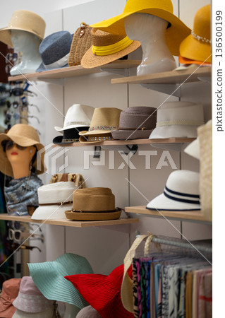 fashion hats on shelves in a stylish boutique or store 136500199