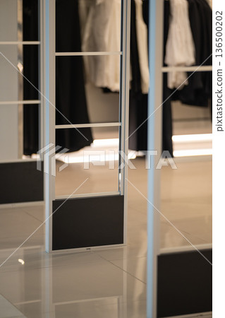 Anti-theft security gate in a clothing store 136500202