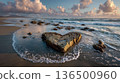 A heart-shaped stone, waves washing around it, sunset lighting, romantic atmosphere, nature's Valentine 136500960