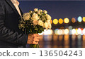 A man with a bouquet 136504243
