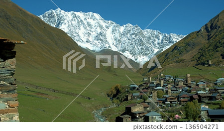 The small mountain village of Ushguli is located at the foot of Mount Shkhara. Caucasus Mountains. Georgia. Svaneti. The small mountain village of Ushguli is located at the foot of Mount Shkhara. Caucasus Mountains. Georgia. Svaneti. 136504271