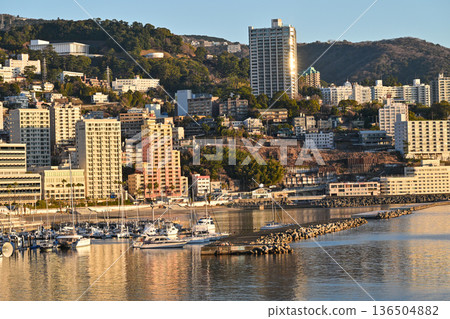 Atami Onsen illuminated by the morning sun Atami Onsen illuminated by the morning sun 136504882