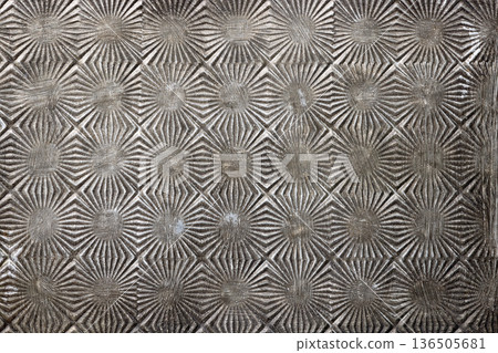 Vintage metal texture with geometric embossed pattern Vintage metal texture with geometric embossed pattern 136505681