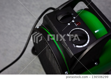 Raise temperature in your home for comfort. Temperature controller and operating mode selection for apartment floor heater. Solution for home heating problems. Increasing temperature Raise temperature in your home for comfort. Temperature controller and operating mode selection for apartment floor heater. Solution for home heating problems. Increasing temperature 136506299