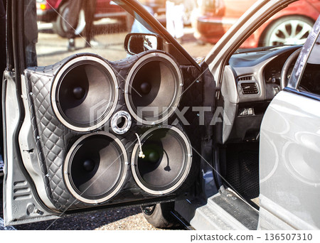 Modified Car Door With Three Speakers And Tweeter. Unique Audio Installation With Purple Accents. Modified Car Door With Three Speakers And Tweeter. Unique Audio Installation With Purple Accents. 136507310