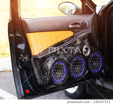 Loudspeakers With Purple Protective Grilles On Car Door. Detailed View Of A Custom Sound System. Loudspeakers With Purple Protective Grilles On Car Door. Detailed View Of A Custom Sound System. 136507311