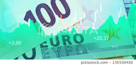 Euro banknotes and a stock market chart show financial trends and values in 2023 136508488