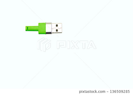 Green usb plug for connection on white Green usb plug for connection on white 136509285