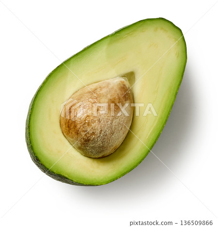 Fresh green avocado half with pit isolated on white background, top view 136509866