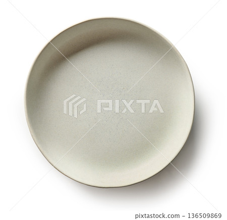 Empty light ceramic bowl in warm gray pastel color isolated on white background, top view Empty light ceramic bowl in warm gray pastel color isolated on white background, top view 136509869