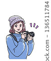 Illustration of a smiling woman holding a camera 136511784