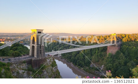 This is Clifton Suspension Bridge with hot ballon in summer time 136512021