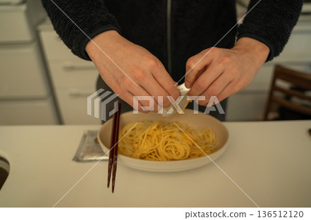 Man making pasta Man making pasta 136512120