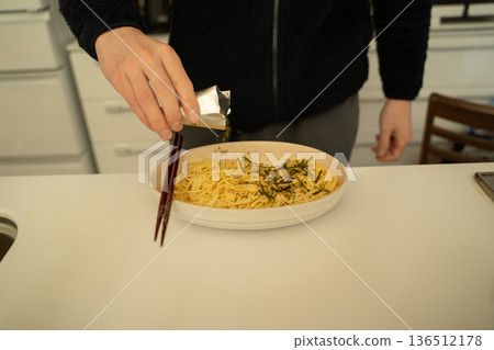 Man making Japanese-style pasta Man making Japanese-style pasta 136512178