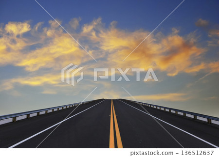 Road lines, clouds and sky in florida Road lines, clouds and sky in florida 136512637