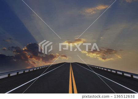 Road lines, clouds and sky in florida Road lines, clouds and sky in florida 136512638