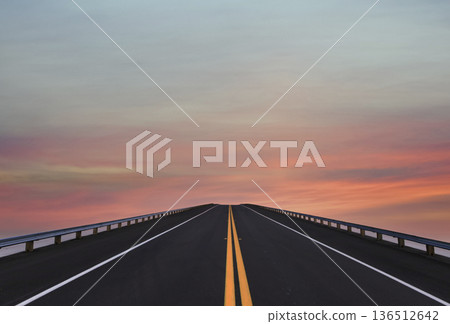 Road lines, clouds and sky in florida Road lines, clouds and sky in florida 136512642