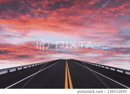Road lines, clouds and sky in florida Road lines, clouds and sky in florida 136512645