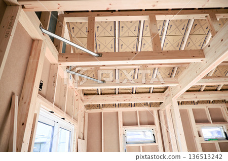 Image of a house: Wooden one-story frame under construction 136513242