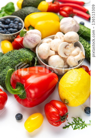 Healthy eating concept with fresh colorful vegetables and fruits Healthy eating concept with fresh colorful vegetables and fruits 136513309
