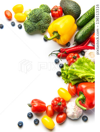 Fresh vibrant vegetables and fruits creating healthy eating border 136513316