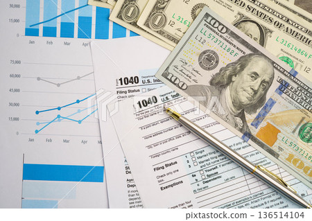 Tax form 1040 U.S. Individual Income Tax Return, business finance concept. Tax form 1040 U.S. Individual Income Tax Return, business finance concept. 136514104