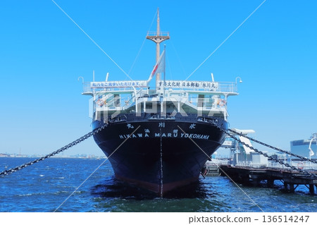 A full view of the front of the Nippon Yusen "Hikawa Maru," a historic passenger ship in Yokohama, shining against the blue sky A full view of the front of the Nippon Yusen "Hikawa Maru," a historic passenger ship in Yokohama, shining against the blue sky 136514247
