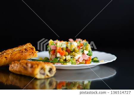Traditional eastern European Olivier salad closeup view Traditional eastern European Olivier salad closeup view 136514727