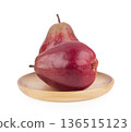 Fresh pear fruit on wooden plate isolated on white background. 136515123