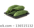 Fresh bitter gourd Bitter cucumber or bitter melon with cut slice isolated on a white background. 136515132