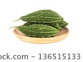 Fresh bitter gourd Bitter cucumber or bitter melon with cut slice isolated on a white background 136515133