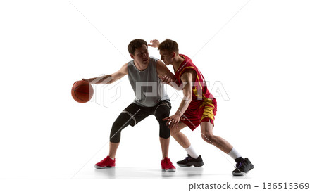 Basketball defender spreading arms to guard opponent isolated on white background. 136515369