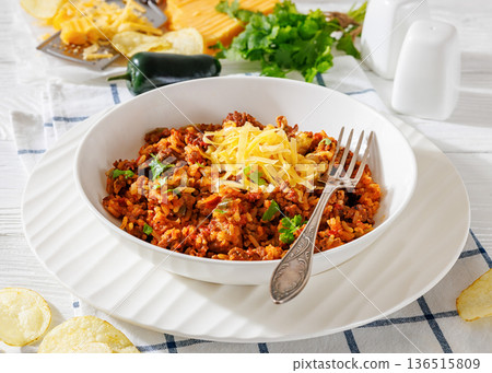 Texas hash of beef pepper onion tomato and rice 136515809