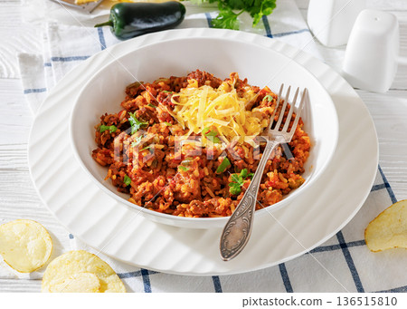 Texas hash of beef pepper onion tomato and rice 136515810