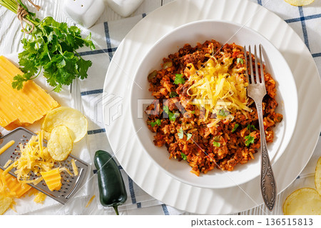 Texas hash of beef pepper onion tomato and rice 136515813
