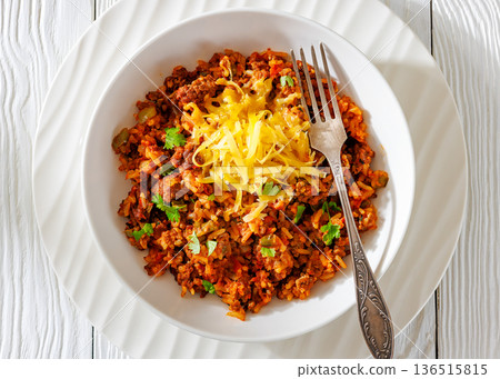 Texas hash of beef pepper onion tomato and rice 136515815