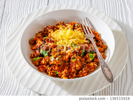 Texas hash of beef pepper onion tomato and rice 136515816
