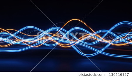 Abstract Blue and Orange Light Trails on Dark Background 136516537