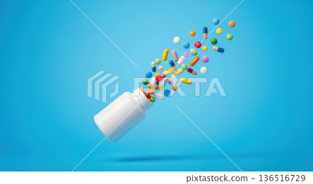 Colorful Medical Capsules Flying Out of White Pill Bottle Colorful Medical Capsules Flying Out of White Pill Bottle 136516729