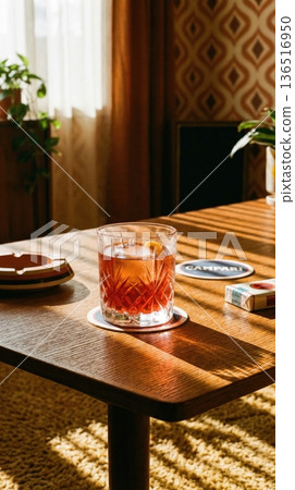 Refreshing Negroni Cocktail Held Over Mediterranean Sea View Refreshing Negroni Cocktail Held Over Mediterranean Sea View 136516950