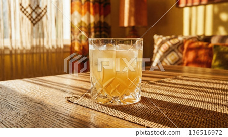 Refreshing Negroni Cocktail Held Over Mediterranean Sea View Refreshing Negroni Cocktail Held Over Mediterranean Sea View 136516972