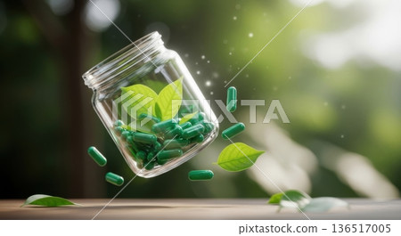 Herbal Medicine Green Capsules in Glass Jar with Fresh Leaves Herbal Medicine Green Capsules in Glass Jar with Fresh Leaves 136517005