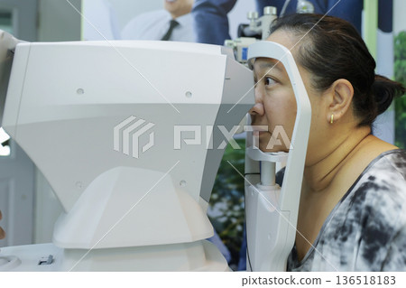 Phoropter for eye test, lenses glasses for eye check in optical store. 136518183