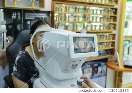 Phoropter for eye test, lenses glasses for eye check in optical store. 136518185