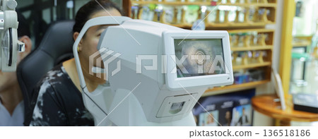 Phoropter for eye test, lenses glasses for eye check in optical store. 136518186