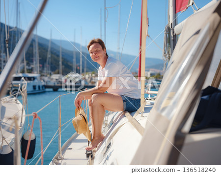 Adult Woman Enjoying Sunny Day On Yacht Finike Marina Turkey Adult Woman Enjoying Sunny Day On Yacht Finike Marina Turkey 136518240